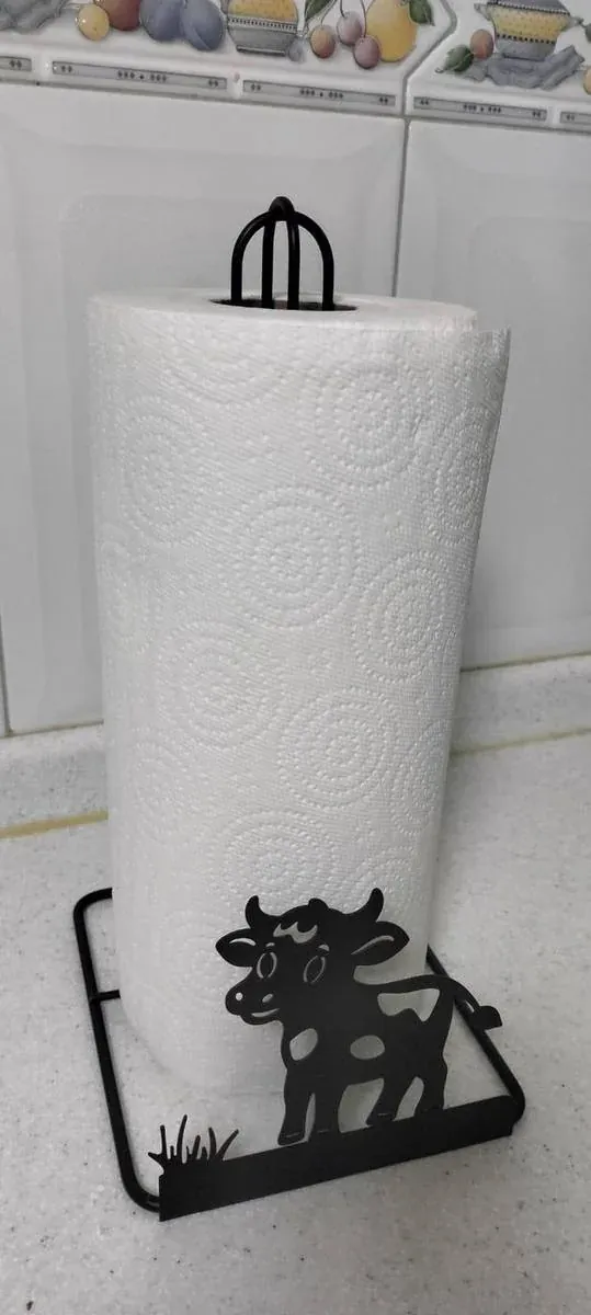 Portarrollos decorativo de acero fabricado por ARANSA — Base de lámina con figura cortada y acabado negro.