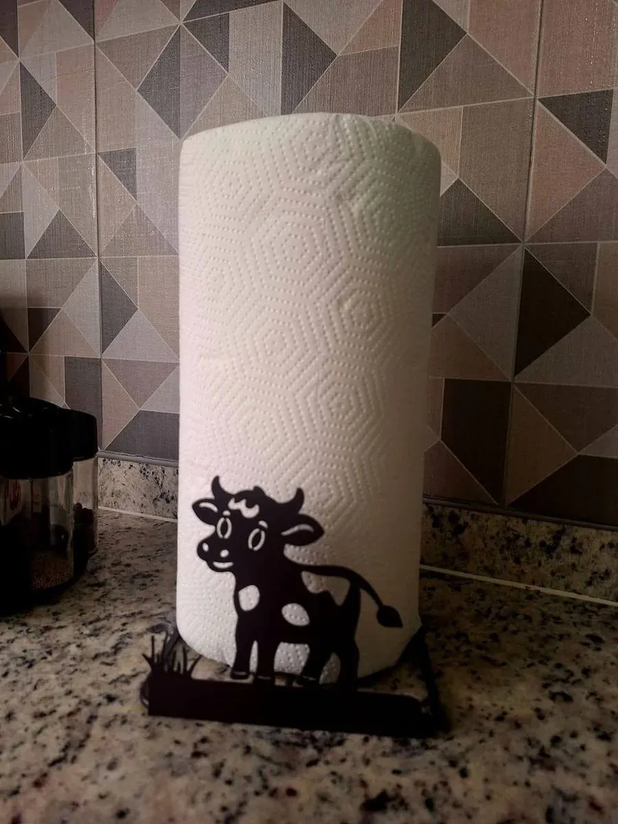 Portarrollos decorativo de acero fabricado por ARANSA — Base de lámina con figura cortada y acabado negro.