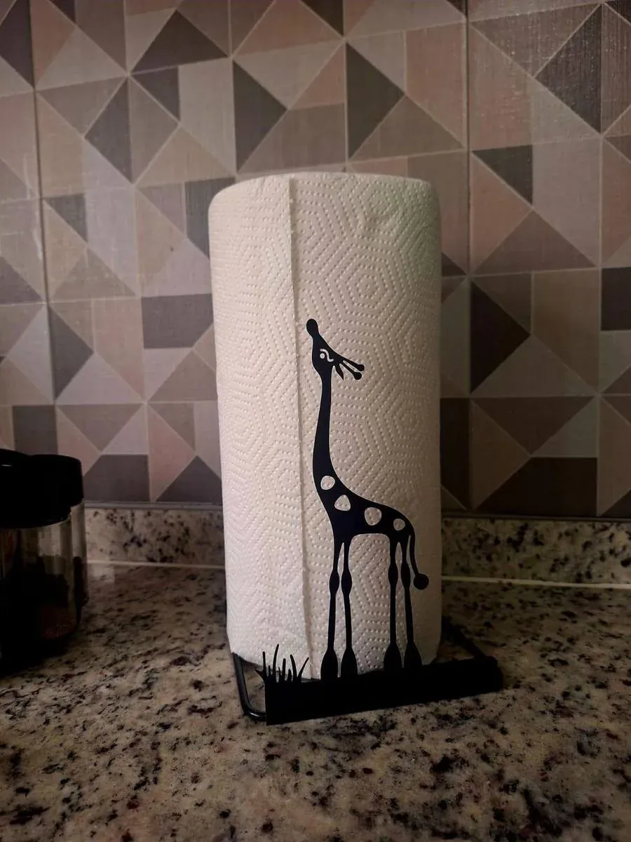 Portarrollos decorativo de acero fabricado por ARANSA — Base de lámina con figura cortada y acabado negro.