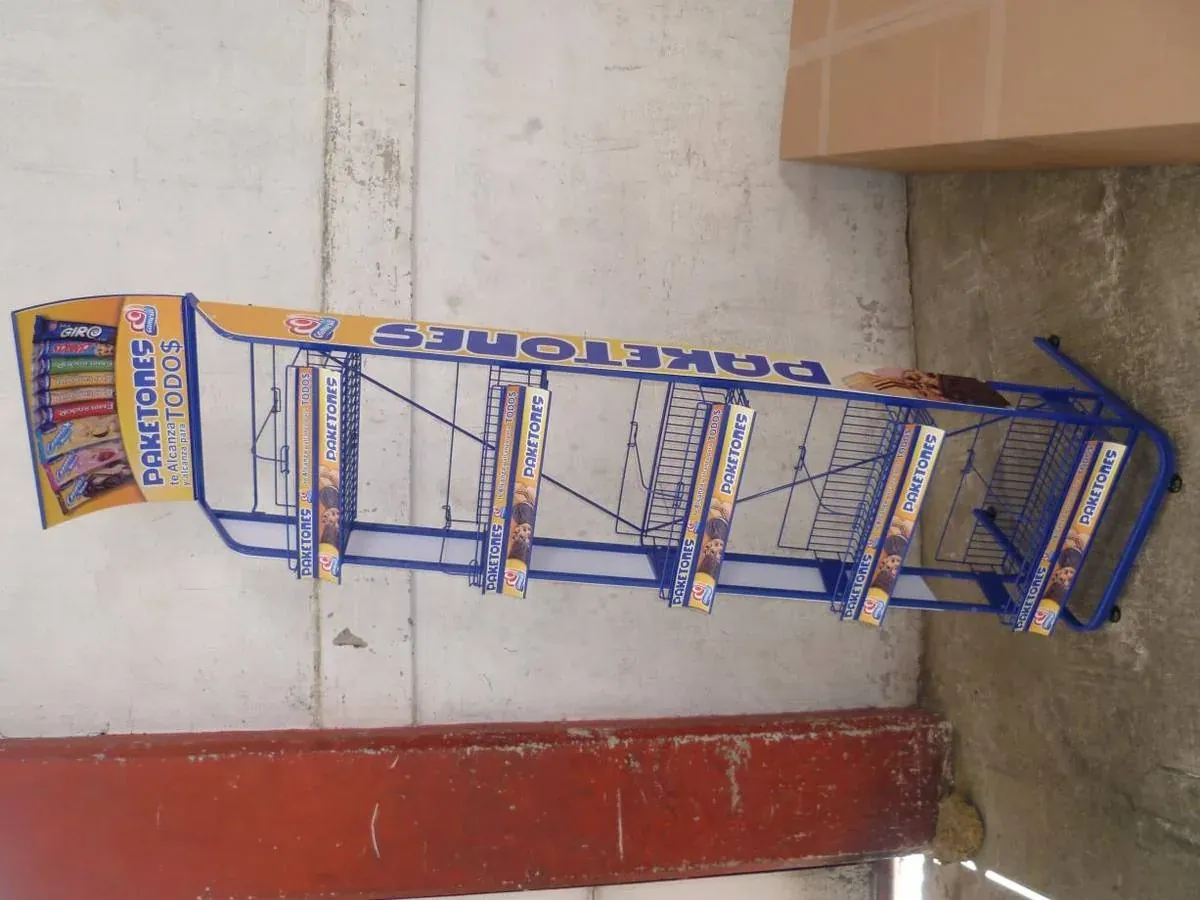 Exhibidor de repisa de acero fabricado por ARANSA — Repisas metálicas con panel gráfico a doble cara.